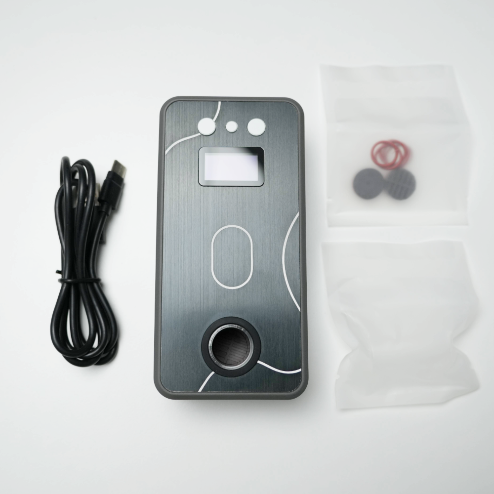 Lieferumfang des Battery-Free Ganz Flare V2 mit Induktionsheizer, USB-C-Kabel und Zubehörteilen auf weißem Hintergrund