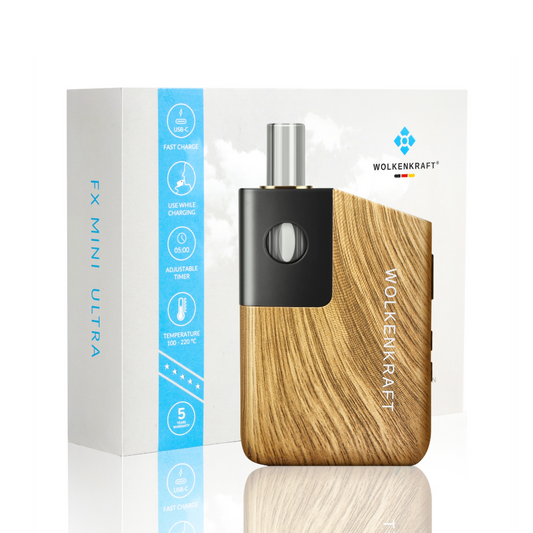 Wolkenkraft FX Mini Ultra Vaporizer in Holzoptik mit Verpackung im Hintergrund